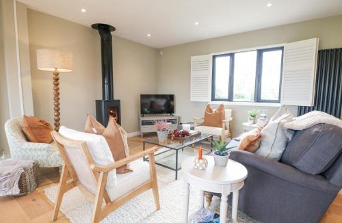 Busbridge House | Holm Oaks Cottage