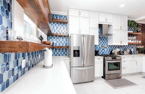 Benton Park West Condo | Home 4 King Beds - Large Garage by StayStLouis