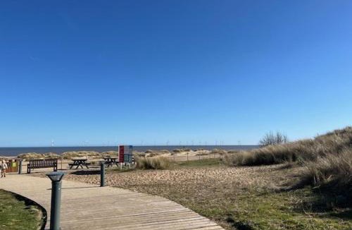Caister-on-Sea Ski Chalet | Home by the Sea - Adventure Village Access