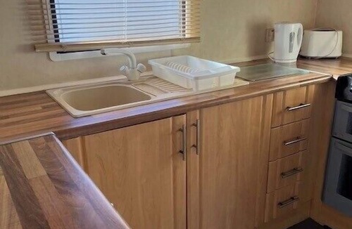 Caister-on-Sea Ski Chalet | Home by the Sea - Adventure Village Access