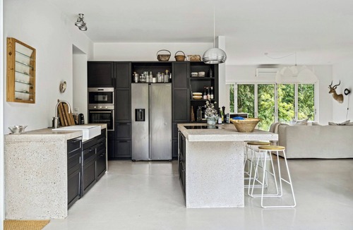 Rrvig House | Home with panoramic windows and stones