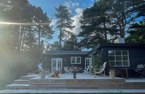 Udsholt Sand House | Home with recycled finds near nature
