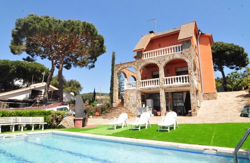 Santa Susanna Villa | HomeHolidaysRentals Corinne