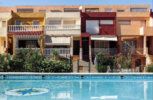 Playa Pobla de Farnals Apartment | Homerez - "Apartment with pool in Puebla de Farnáls"