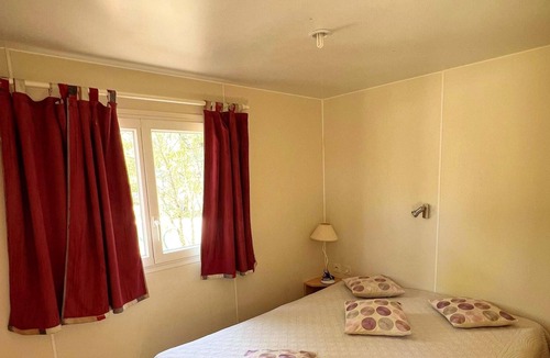 Mejannes-le-Clap House | Homerez - Bungalow for 6 ppl. with shared pool and terrace at Méjannes-le-Clap