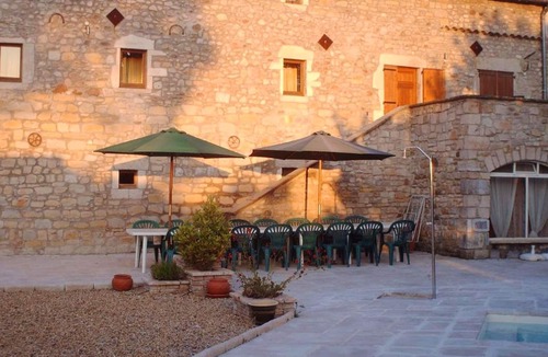 Saint-Alban-sous-Sampzon House | Homerez - House for 6 ppl. with shared pool, garden and terrace at Grospierres