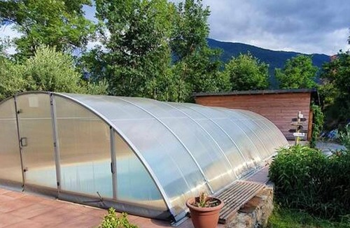 Ax-les-Thermes Ski Chalet | Homerez - Nice chalet for 4 ppl. with shared pool and terrace at Ax-les-Thermes