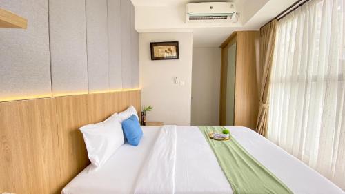 Ciputat Apartment | Homey and Good Place 2BR Transpark Bintaro Apartment By Travelio