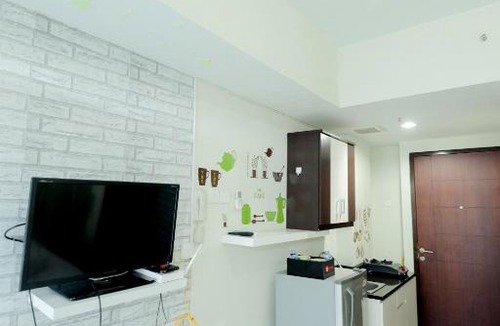 Bekasi Timur Apartment | Homey Studio @ Grand Dhika City Apartment By Travelio