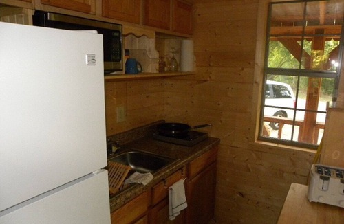 Tia Juana Cabin | Honeymoon Studio Cabin, with Hot Tub in Disney Ok