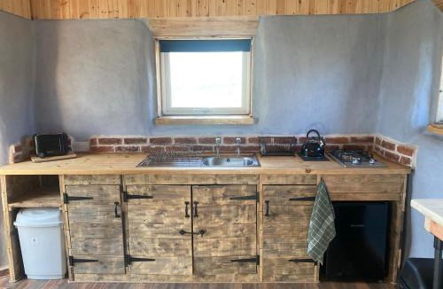 Forres House | Honeysuckle Straw Bale Cabin