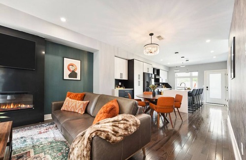 Lawrenceville House | ★ HostWise Stays ★ Rooftop Deck & Fire Pit Haven | Theater & Balcony
