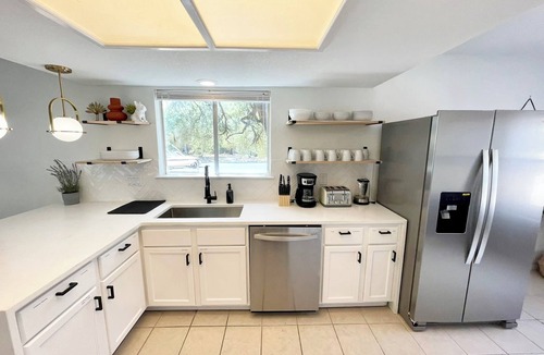 Milwood House | Hot tub) 4 Room Domain: Foosball