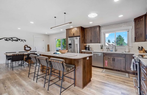 Northeast Colorado Springs House | Hot tub, fire pit, and deck | Mountain view in COS