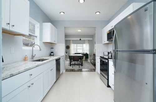 Eastside Promise Neighborhood House | Hot Tub - Jacuzzi - Hays Hideaway - Pet Friendly