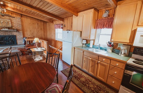 Heltonville Cabin | Hot tub overlooking Lake Monroe. Pet Friendly!