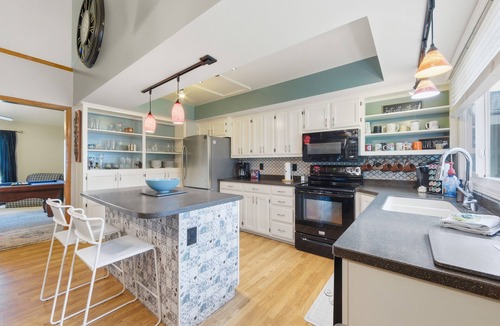 Wichita House | Hot Tub - Pool Table - Fire Pit - Family Friendly! Hosted by Homes by CNJ.