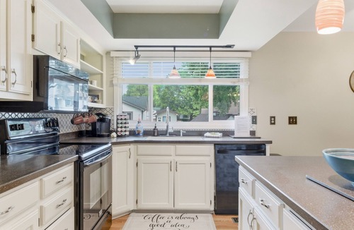 Wichita House | Hot Tub - Pool Table - Fire Pit - Family Friendly! Hosted by Homes by CNJ.