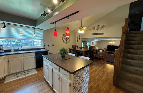 Wichita House | Hot Tub - Pool Table - Fire Pit - Family Friendly! Hosted by Homes by CNJ.