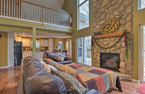 Blue Eye Cottage | Hot Tub & Wooded Views: Lakefront Blue Eye Cottage
