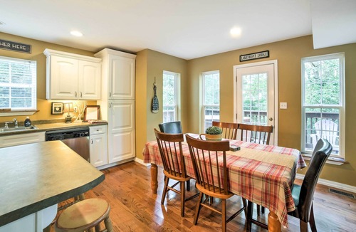 Blue Eye Cottage | Hot Tub & Wooded Views: Lakefront Blue Eye Cottage