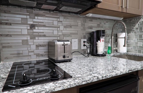 New Caney Hotel | Hotel Manhattan, BW Signature Collection