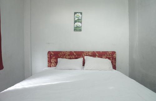 Melayu Hotel | Hotel O Losmen Arkansas Syariah