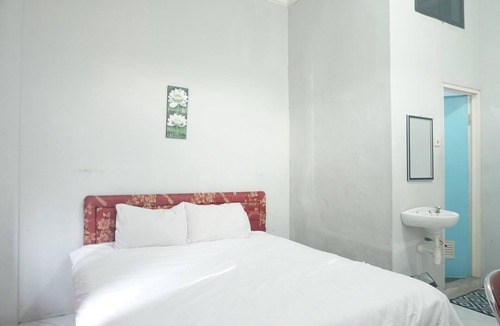 Melayu Hotel | Hotel O Losmen Arkansas Syariah