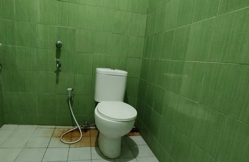 Melayu Hotel | Hotel O Losmen Arkansas Syariah