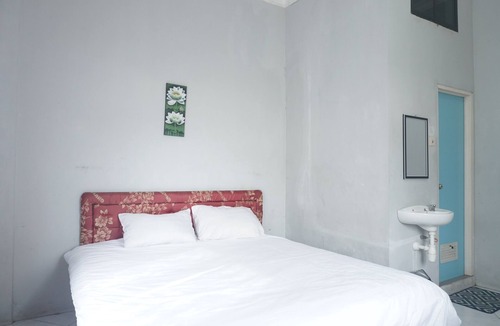 Melayu Hotel | Hotel O Losmen Arkansas Syariah