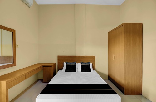 Sunset Road Hotel | Hotel O near Trans Studio Theme Park formerly Cyloam Residence