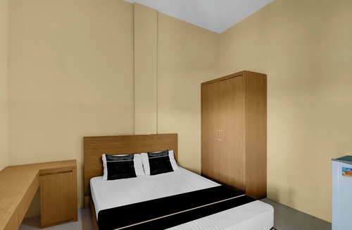 Sunset Road Hotel | Hotel O near Trans Studio Theme Park formerly Cyloam Residence