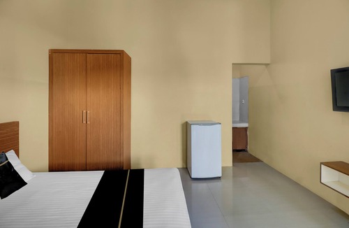 Sunset Road Hotel | Hotel O near Trans Studio Theme Park formerly Cyloam Residence