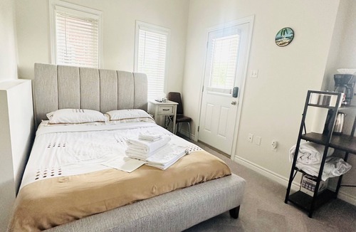 Guelph House | Hotel style private main level if townhome