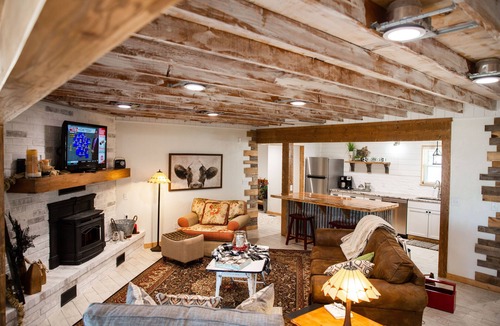 Checotah House | House on the lake with a large sandy beach just steps from the back door.