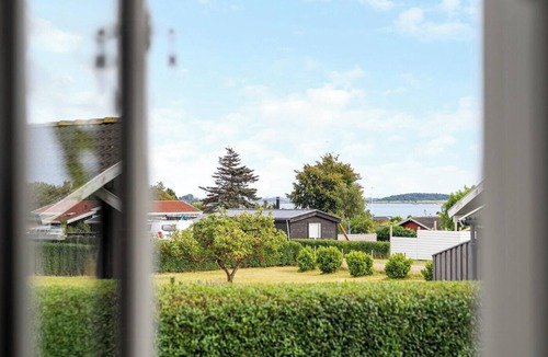 Holbaek House | House with ferry views by Isefjorden