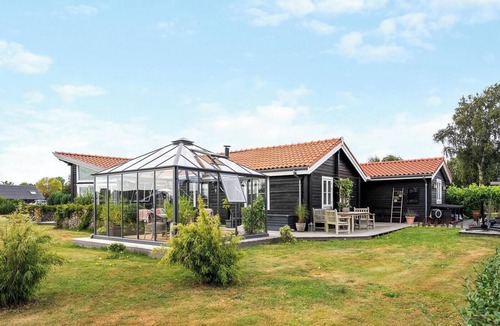 Holbaek House | House with ferry views by Isefjorden
