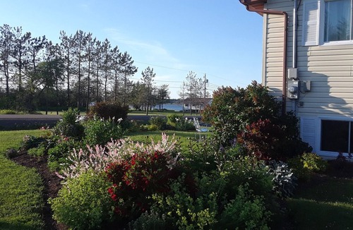 Saint-Joseph-de-Kent House | House with multi-level deck and water views in Bouctouche