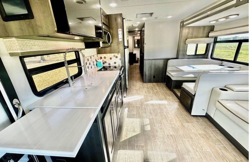 Elgin House | Howdy RV - 2023 Luxury Motor Coach - Sleeps 10