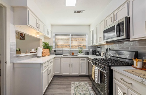 Central Southwest House | Htown Hot Tub Getaway | Swing Set BBQ Yard Games