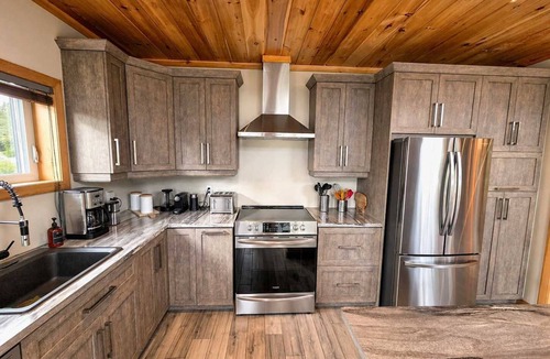 Saint-David-de-Falardeau Ski Chalet | Huard | Tavata Chalets | Petit paradis sur le lac