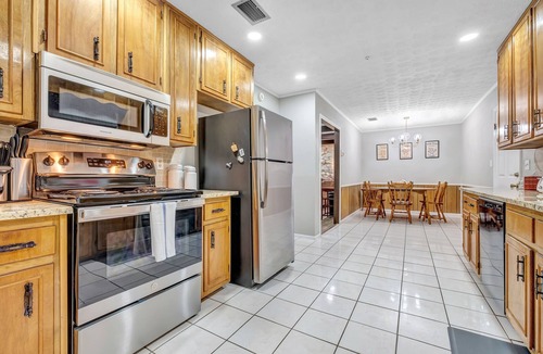 Tallahassee House | Hudson Manor (4-Bedroom Home) by RedAwning