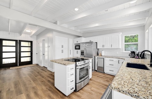 Sunrise Beach Village House | Huge Waterfront Home on Lake Lbj with Pool, HotTub, Island, Boat Ramp and Slips