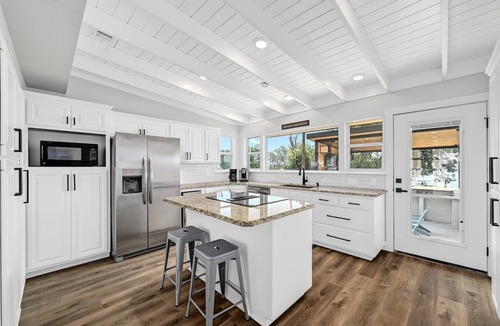 Sunrise Beach Village House | Huge Waterfront Home on Lake Lbj with Pool, HotTub, Island, Boat Ramp and Slips