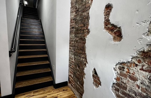 Glens Falls Apartment | Huge Windows Downtown 2Bd Apt w/Main Strip Access