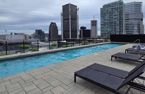 International District Apartment | Humaniti - Furnished 1-Bedroom in Montreal