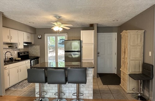 High Point House | Humble Hideaway - Inviting lakefront home with firepit, balcony & W/D - dog-friendly