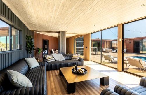 Yucca Valley Villa | Iconic 7,000sf Glass Villa with 2 Pools on 350 Acres