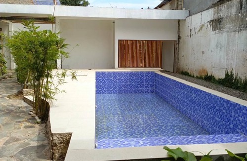 Jatinegara Villa | Japandi inspired Ryokan in Jakarta, Great location with large swimming pool