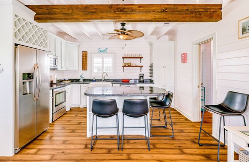 Galveston House | Ideal getaway steps from the beach with fast WiFi, central AC, deck, grill & W/D
